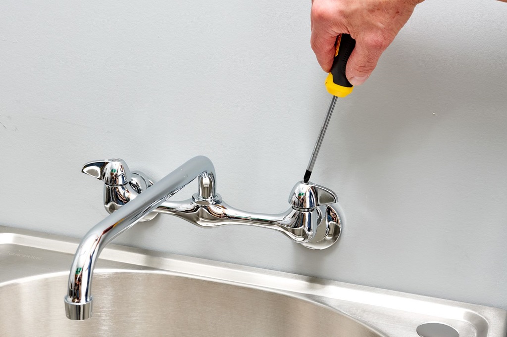 How do you fix a dripping kitchen faucet?