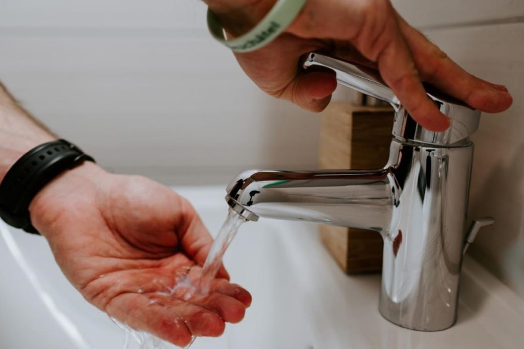 How do I stop my bathroom faucet from dripping?