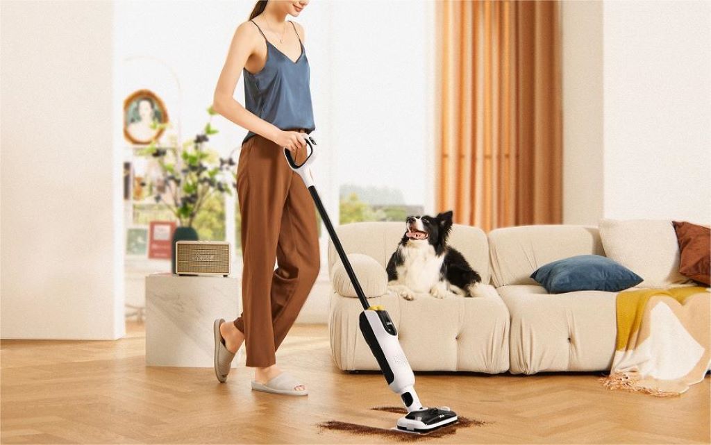 Lightweight cordless vacuum cleaning pet hair from hardwood floors and rugs, highlighting efficient everyday cleaning in Michigan