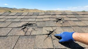 Roof hail damage on asphalt shingles in Denver Colorado